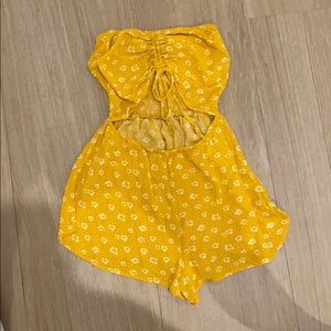 Yellow Skyler and Madison romper w/ white flowers
